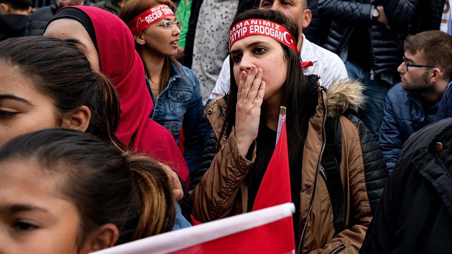 AKP supporters wait for the election results in Istanbul on May 14, 2023. 