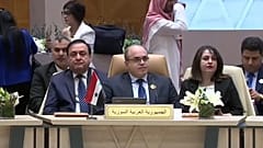 الوفد السوري خلال الاجتماع