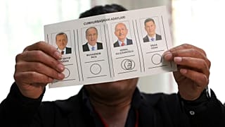 FILE: Election worker holds a ballot depicting a vote for Kemal Kilicdaroglu, CHP, at a polling station, 14 May 2023