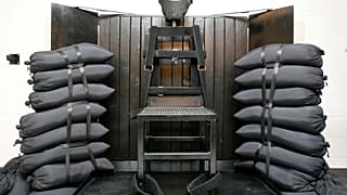 FILE - A chair sits in the execution chamber at the Utah State Prison on June 18, 2010, after Ronnie Lee Gardner was executed by firing squad in Draper, Utah.