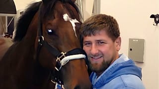 Ramzan Kadyrov with his horse Zazu. 