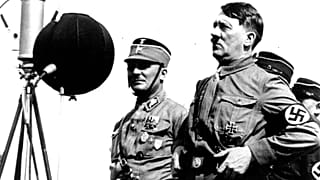 German chancellor Adolf Hitler speaks to 30,000 uniformed Nazi storm troopers at Kiel, Germany on May 7, 1933.