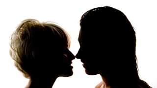 Two people kissing