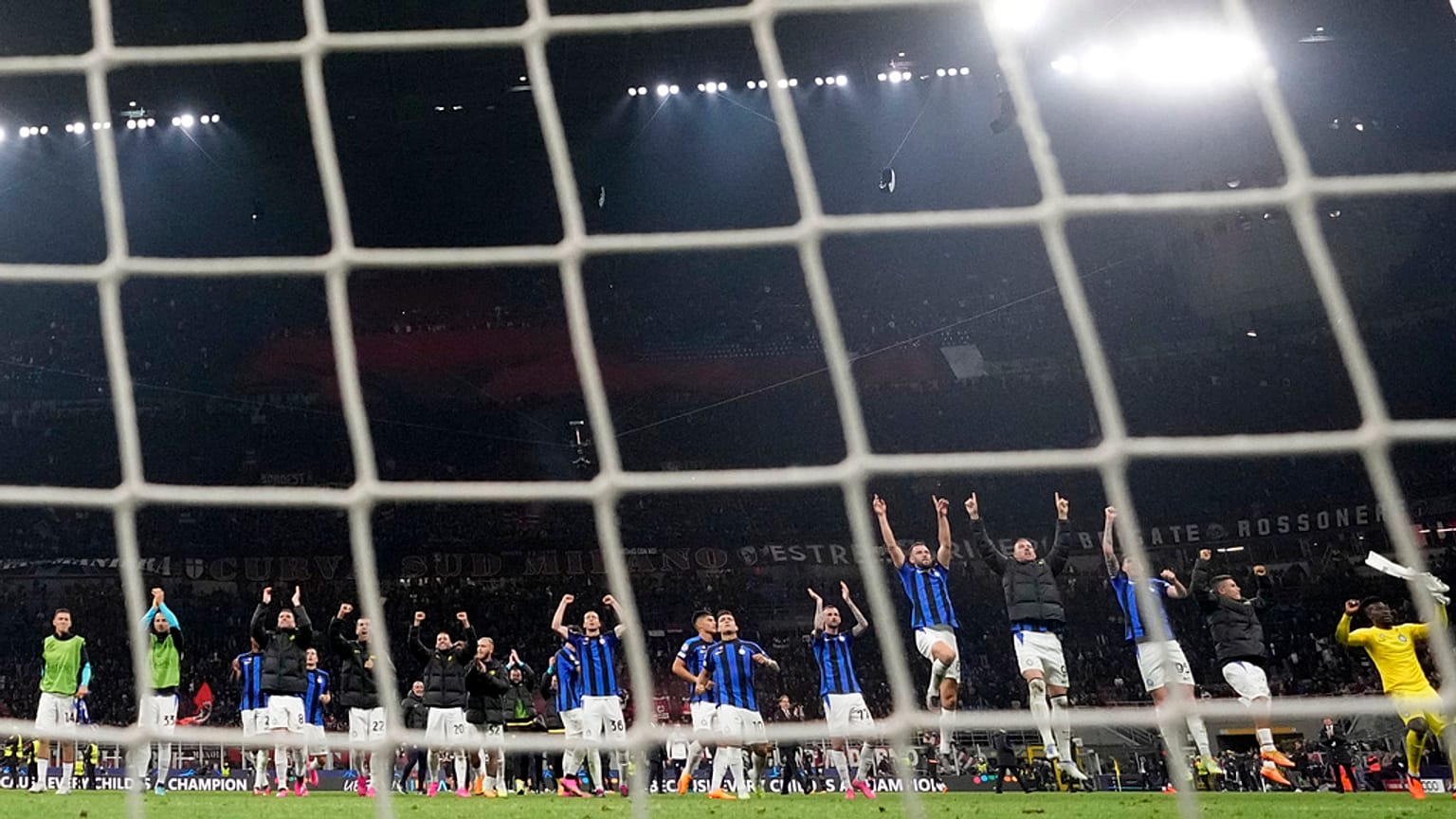 Team Inter Milan celebrate after the Champions League semifinal first leg soccer match between AC Milan and Inter Milan at the San Siro stadium in Milan.