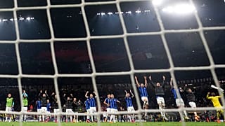 Team Inter Milan celebrate after the Champions League semifinal first leg soccer match between AC Milan and Inter Milan at the San Siro stadium in Milan.