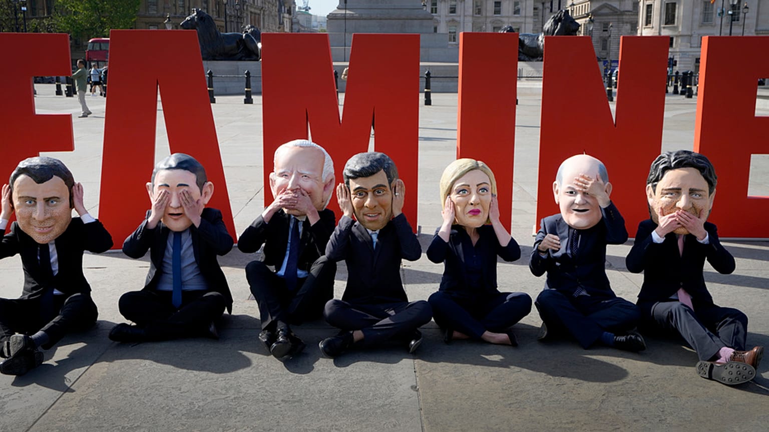 Oxfam's satirical 'big heads' of the G7 leaders pose ahead of the start of the G7 summit in Japan, in Trafalgar Square, London, Wednesday, May 17, 2023.
