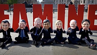 Oxfam's satirical 'big heads' of the G7 leaders pose ahead of the start of the G7 summit in Japan, in Trafalgar Square, London, Wednesday, May 17, 2023.
