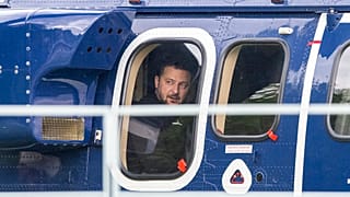 FILE - Ukrainian President Volodymyr Zelenskyy, sits in a Federal Police helicopter after talks with Chancellor Olaf Scholz in Berlin, Germany, Sunday, May 14, 2023.