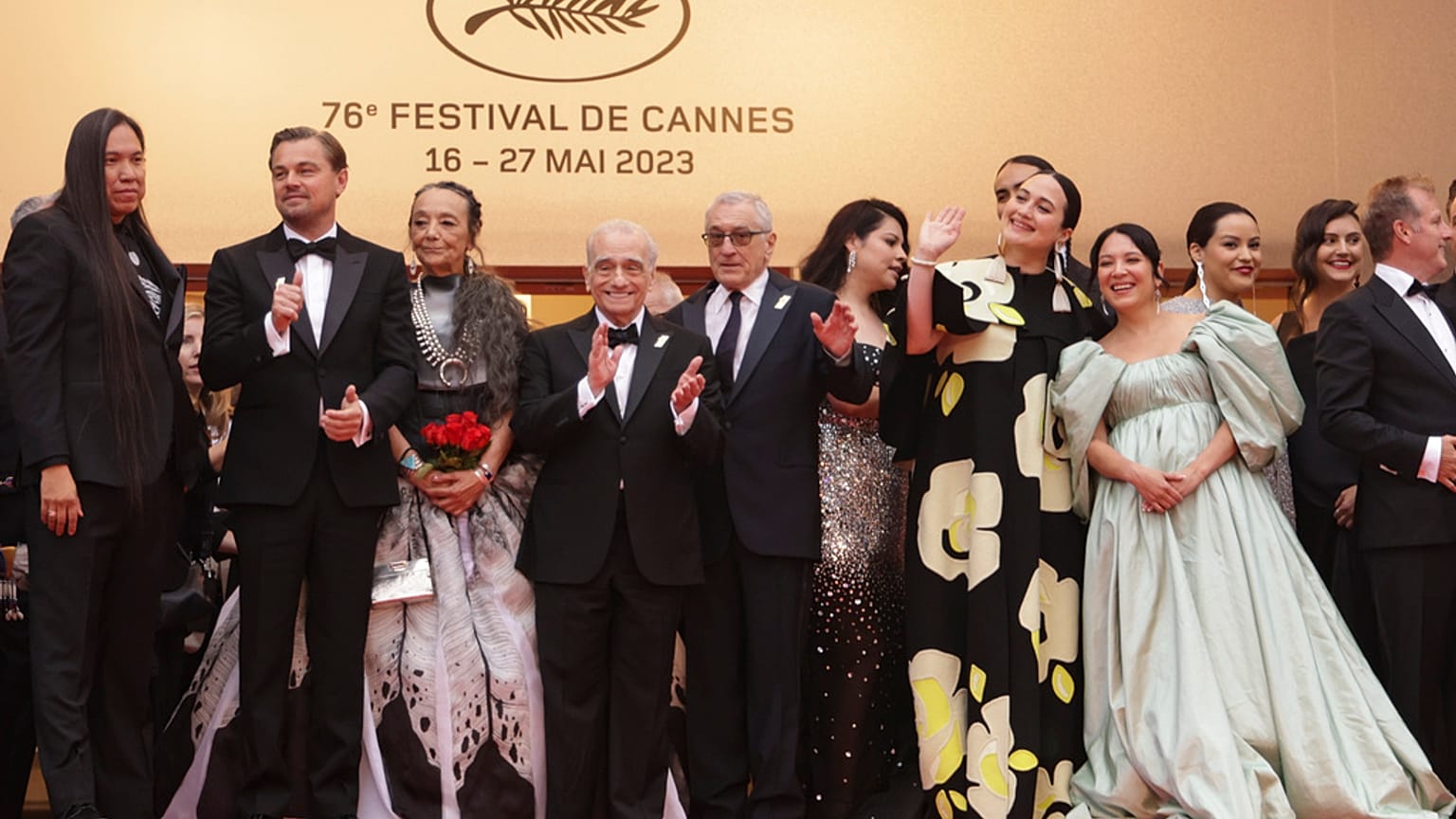 William Belleau, Leonardo DiCaprio, Tantoo Cardinal, director Martin Scorsese, Robert De Niro, Cara Jade Myers, Lily Gladstone and Jillian Dion pose for photographers.