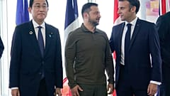 إيمانويل ماكرون وفولوديمير زيلنسكي في قمة مجموعة السبع في هيروشيما