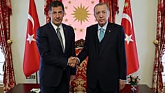 الرئيس التركي رجب طيب إردوغان والمرشح الرئاسي سنان أوغان