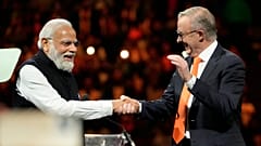Indian Prime Minister Narendra Modi shakes hands with his Australian counterpart Anthony Albanese as at Qudos Bank Arena in Sydney, Australia, Tuesday, May 23, 2023