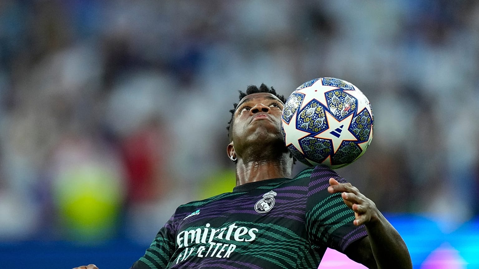 Real Madrid's Vinicius Junior controls the ball during warm up before the Champions League semifinal, May 2023