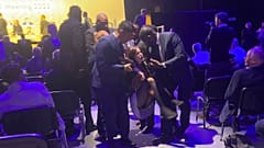 Protesters who tried to storm the stage are taken out of the Excel centre in east London during oil giant Shell's annual general meeting in London, Tuesday, May 23, 2023