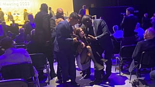 Protesters who tried to storm the stage are taken out of the Excel centre in east London during oil giant Shell's annual general meeting in London, Tuesday, May 23, 2023