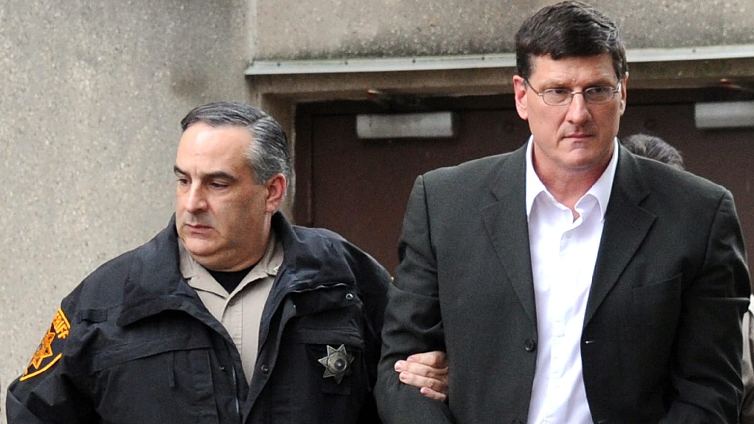 Scott Ritter, former chief UN weapons inspector, in front of a courthouse in the US after he was sentanced to 18-66 months for unlawful contact with a minor. 26 October 2011