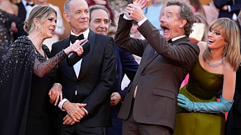 Rita Wilson, from left, Tom Hanks, composer Alexandre Desplat, Bryan Cranston and Maya Hawke at the premiere of the film 'Asteroid City', Cannes Film Festival, 23 May 2023
