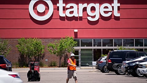 An employee walks outside a Target store in Colorado, United States.