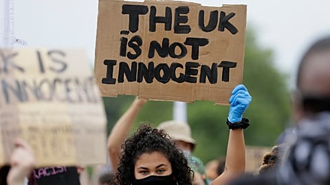 Protesters take part in a demonstration on Wednesday, June 3, 2020, in Hyde Park, London, over the death of George Floyd