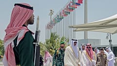 Emir of Qatar Sheikh Tamim bin Hamad Al Thani, center, accompanied by Prince Badr Bin Sultan, deputy governor of Mecca, right, upon his arrival at Jeddah airport, Saudi Arabia