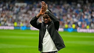 Real Madrid's Vinicius Junior applauds to spectators prior to a Spanish La Liga soccer match.