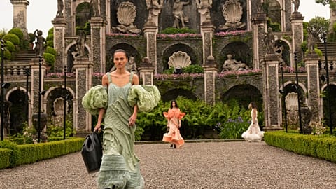A model wears a creation as part of the women's Louis Vuitton Cruise 2024 collection, unveiled on Isola Bella, Italy.