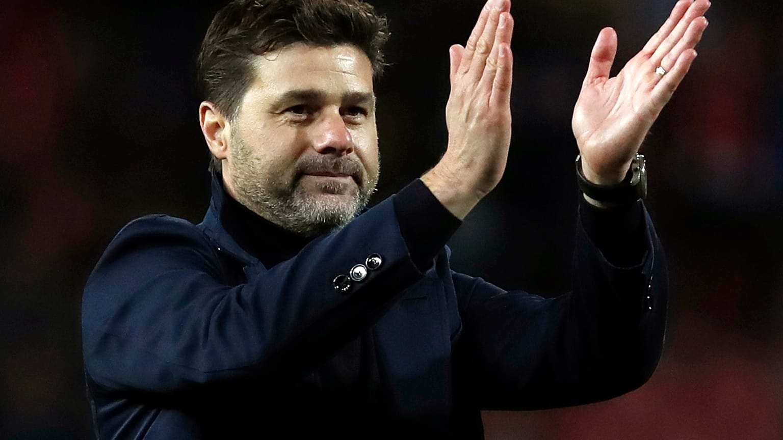 FILE - Mauricio Pochettino applauds fans after the Champions League group B soccer match between Red Star and Tottenham, at the Rajko Mitic Stadium in Belgrade, Serbia,
