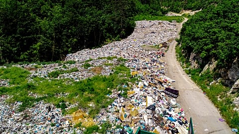 Garbage is dumped on the banks of the Drina river near the eastern Bosnian town of Visegrad, Bosnia, Thursday, May 25, 2023