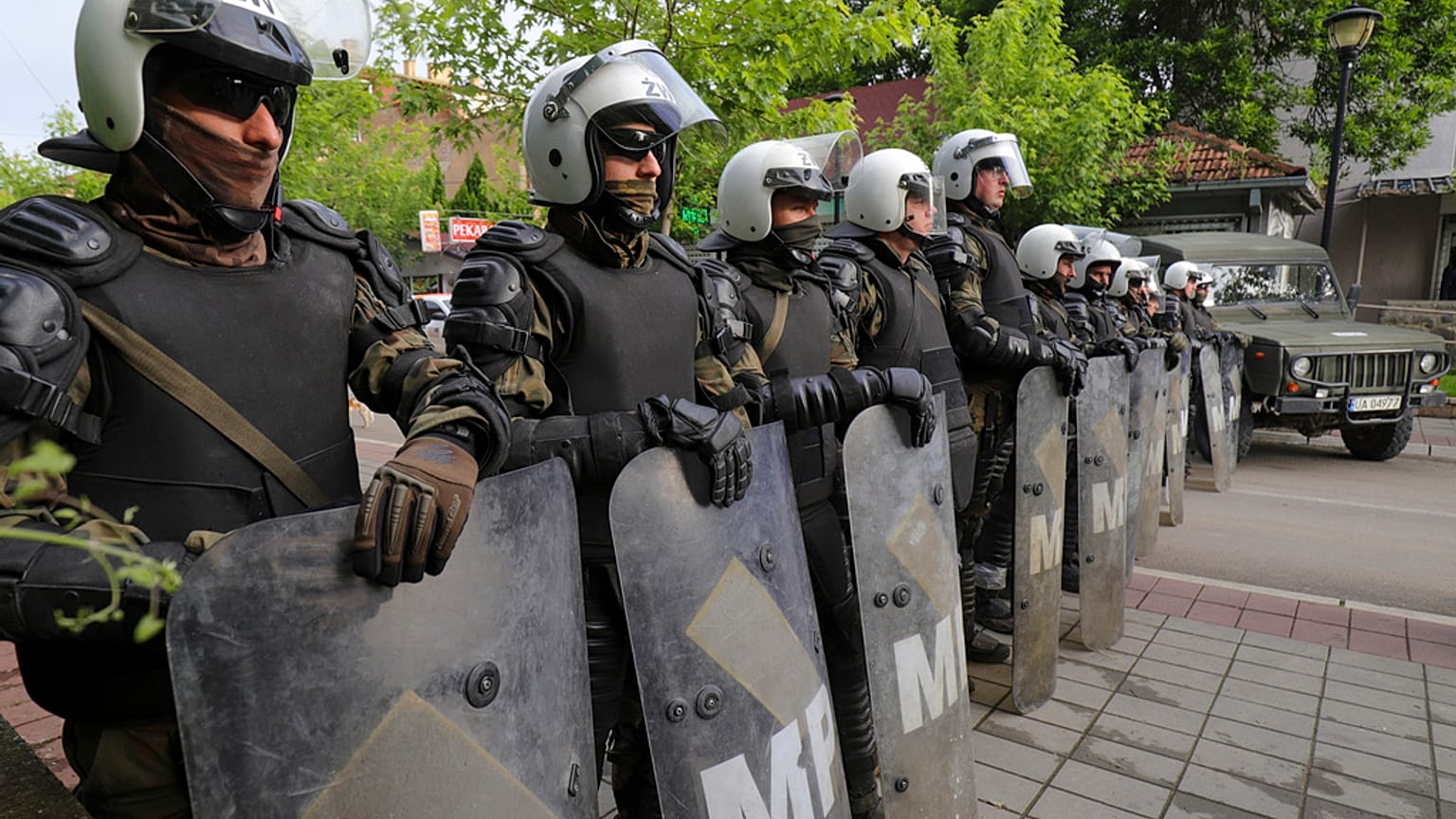Polish soldiers, part of the peacekeeping mission in Kosovo KFOR guard a municipal building in the town of Zvecan, northern Kosovo, May 29. 2023