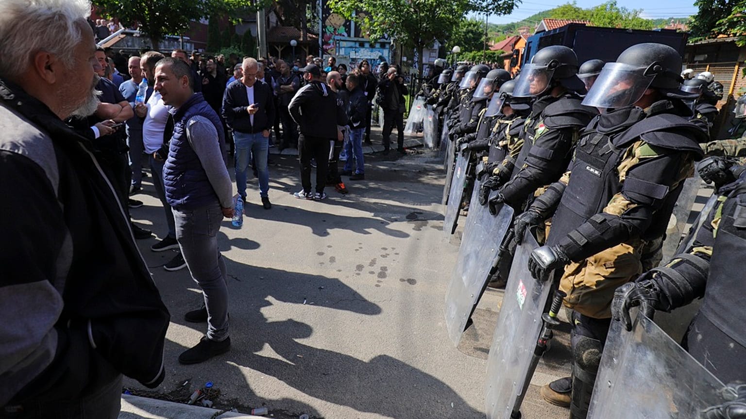 KFOR soldiers guard a municipal building in the town of Zvecan, northern Kosovo, Monday, May 29, 2023.