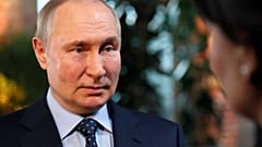 Russian President Vladimir Putin speaks to Director General of the Agency for Strategic Initiatives 