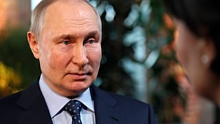 Russian President Vladimir Putin speaks to Director General of the Agency for Strategic Initiatives 