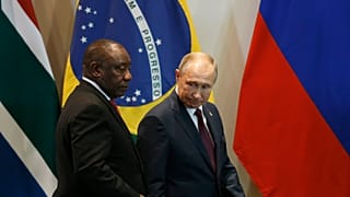 South Africa's President Cyril Ramaphosa and Russia's President Vladimir Putin arriving at a BRICS even in Brazil. 14 November 2019
