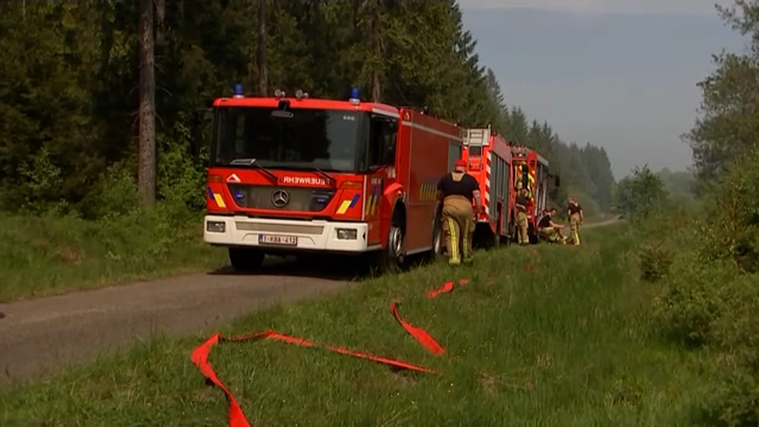 Firemen at the scene in Fagnes, Belgium 