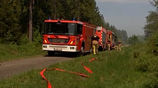Firemen at the scene in Fagnes, Belgium 