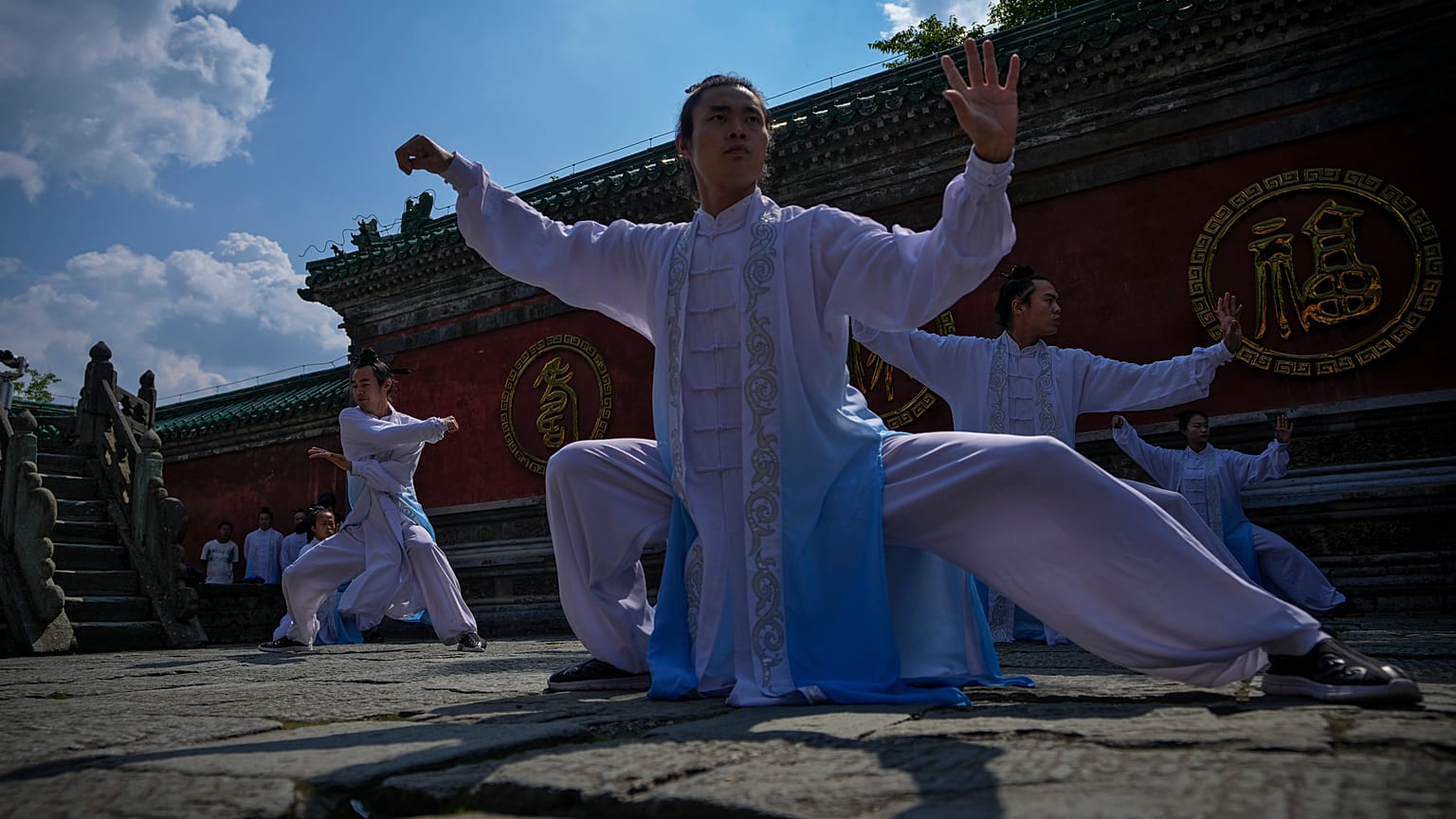 Taoists perform Wudang Tai Chi at Wudangshan Mountain in central China's Hubei Province