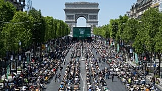 Paris' most iconic street, the Champs-Elysees, was transformed into an open-air mass "dictation" spellathon, Sunday 4 June 2023