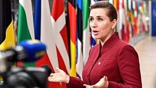 FILE - Denmark's Prime Minister Mette Frederiksen speaks with the media as she arrives for an EU summit at the European Council building in Brussels, March 23, 2023.