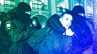 Police officer detain a demonstrator during an action against Russia's attack on Ukraine in St. Petersburg, 24 February 2022