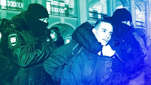 Police officer detain a demonstrator during an action against Russia's attack on Ukraine in St. Petersburg, 24 February 2022