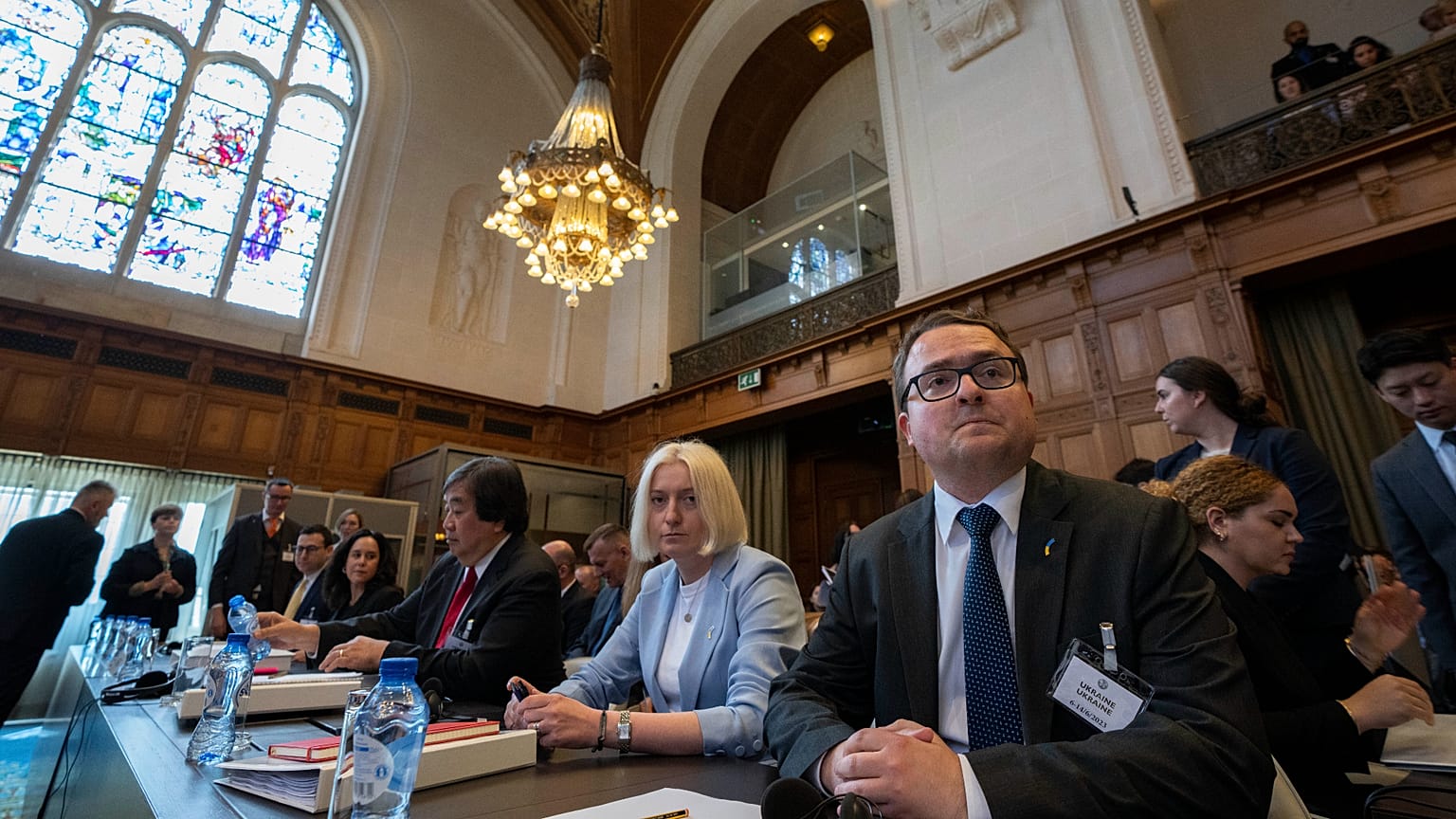 Ukraine's delegation waiting for judges to enter the World Court in The Hague, Netherlands