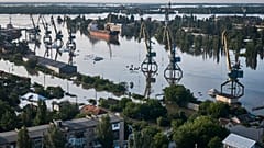 Streets are flooded in Kherson, Ukraine, after the walls of the Kakhovka dam collapsed. 7 June 2023