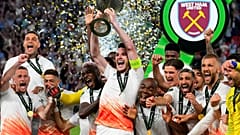 West Ham's Declan Rice lifts the trophy after winning the Europa Conference League final soccer match between Fiorentina and West Ham at the Eden Arena in Prague, Wednesday.