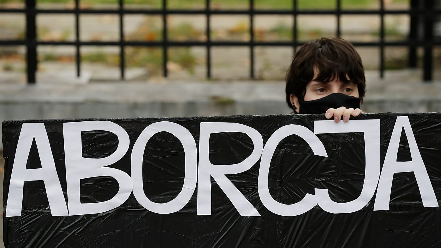 Pro-choice activists from "Women Strike" attend a protest in front of Poland's constitutional court in Warsaw. 22 October 2020