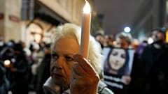 People gather before Poland's Constitutional Tribunal in Warsaw, Poland, on Saturday, Nov. 6, 2021.