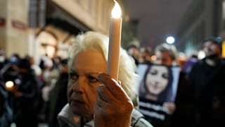 People gather before Poland's Constitutional Tribunal in Warsaw, Poland, on Saturday, Nov. 6, 2021.