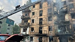 A fire after missiles hit a multi-story apartment building in Kryvyi Rih, Ukraine, Tuesday, June 13, 2023. 