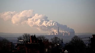 Steam and smoke billow from the Ratcliffe-on-Soar coal-fired power station near Nottingham.