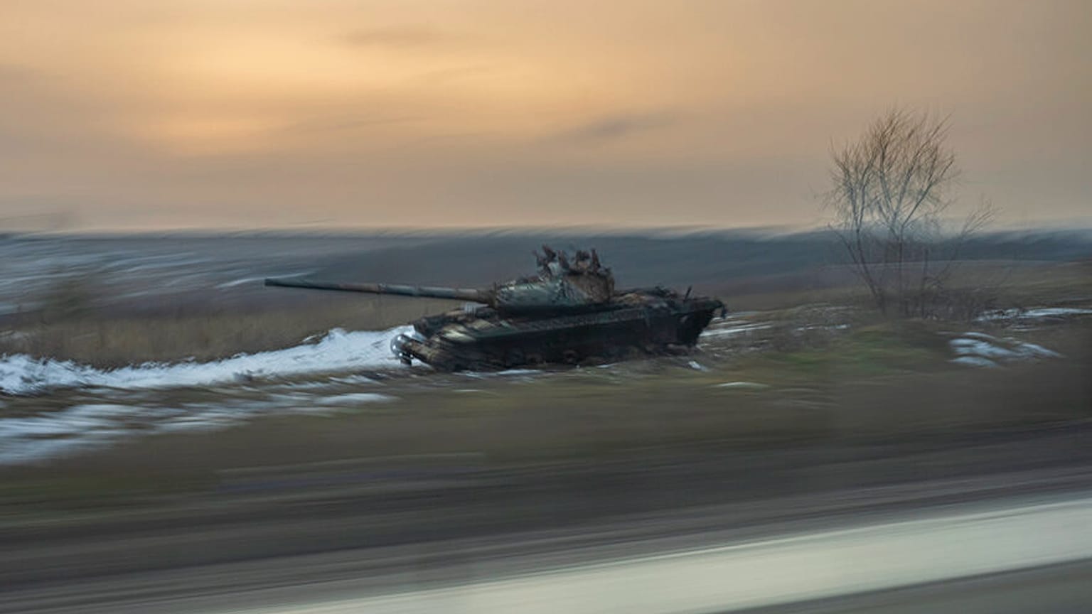 A destroyed tank by the side of the road near the village of Kamyanka, Ukraine, Sunday, Feb. 19, 2023.