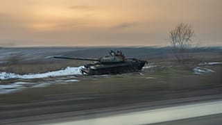 A destroyed tank by the side of the road near the village of Kamyanka, Ukraine, Sunday, Feb. 19, 2023.